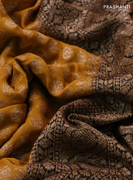 Banarasi georgette saree mustard yellow and black with allover thread & zari woven buttas and woven border