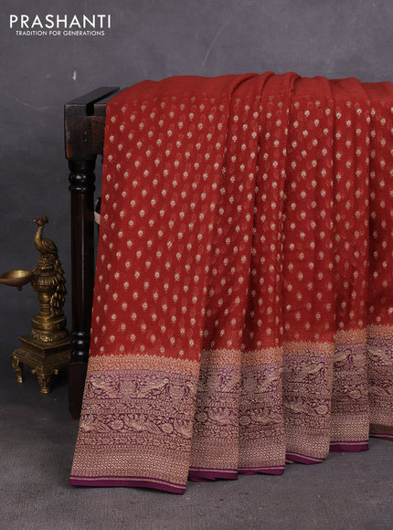 Banarasi georgette saree rustic orange and deep wine with allover thread & zari woven buttas and woven border