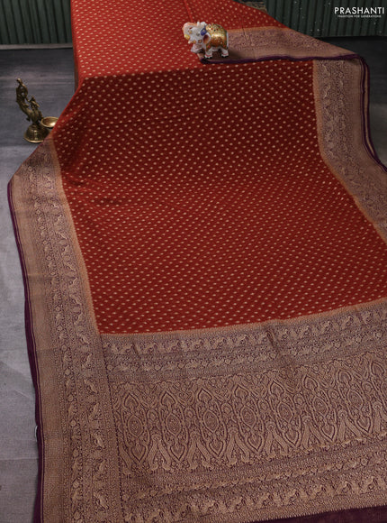 Banarasi georgette saree rustic orange and deep wine with allover thread & zari woven buttas and woven border