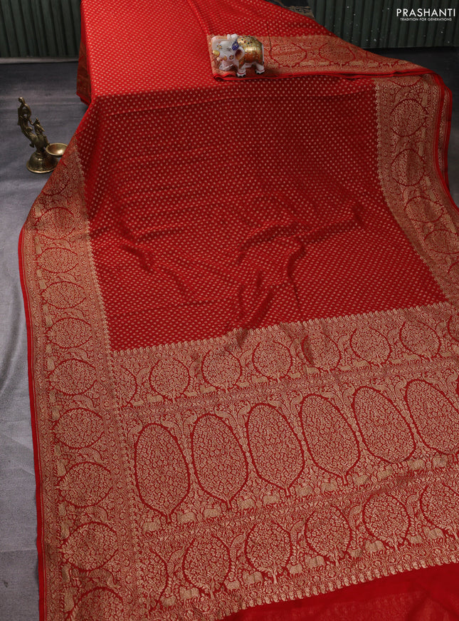Banarasi georgette saree orange with allover thread & zari woven buttas and long woven border