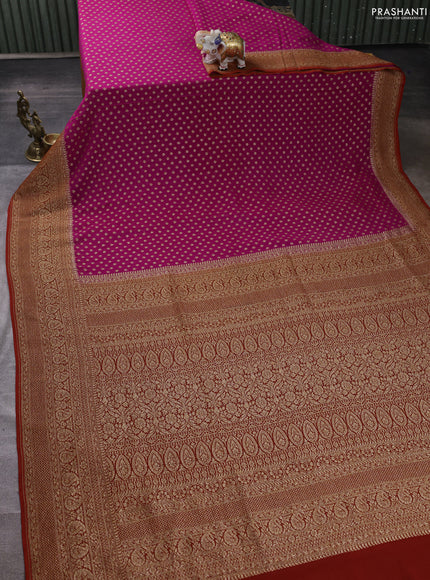 Banarasi georgette saree pink and rust shade with allover thread & zari woven buttas and long woven border