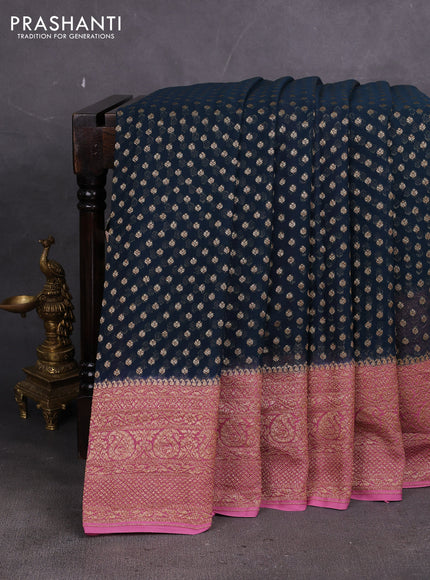 Banarasi georgette saree peacock green and peach pink with allover thread & zari woven buttas and long woven border