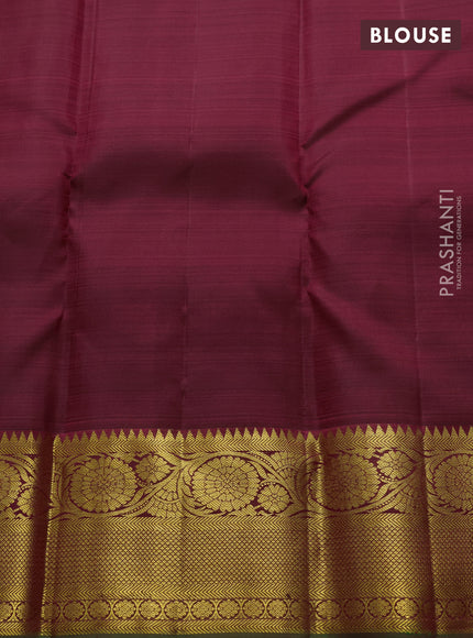 Pure kanchipuram silk saree maroon with allover zari checks & buttas and rich zari woven floral border