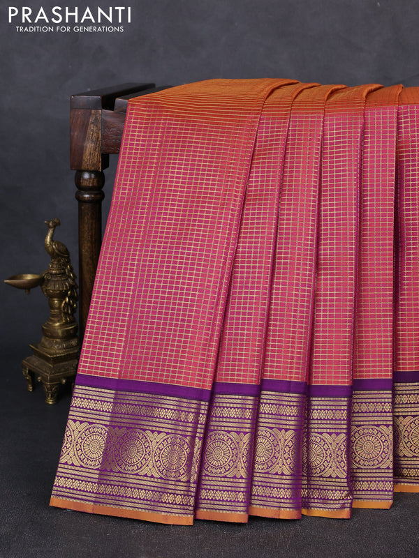 Pure kanchipuram silk saree dual shade of rustic orange and purple with allover zari woven checked pattern and rich zari woven border