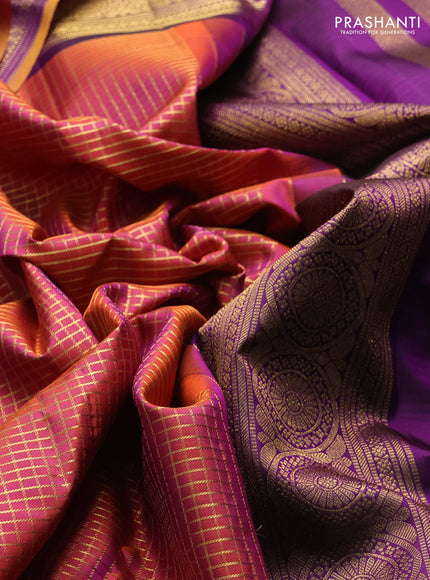Pure kanchipuram silk saree dual shade of rustic orange and purple with allover zari woven checked pattern and rich zari woven border