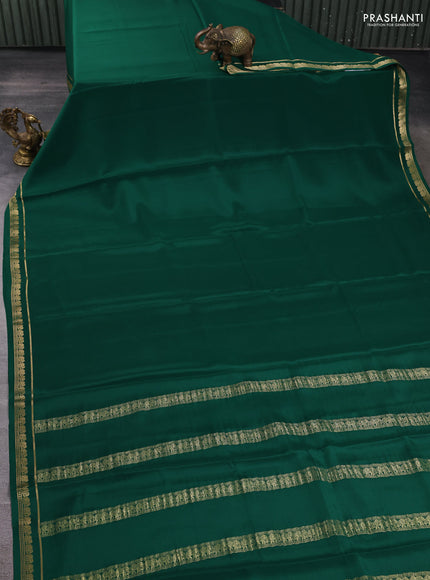 Pure mysore silk saree bottle green with plain body and small elephant zari woven border