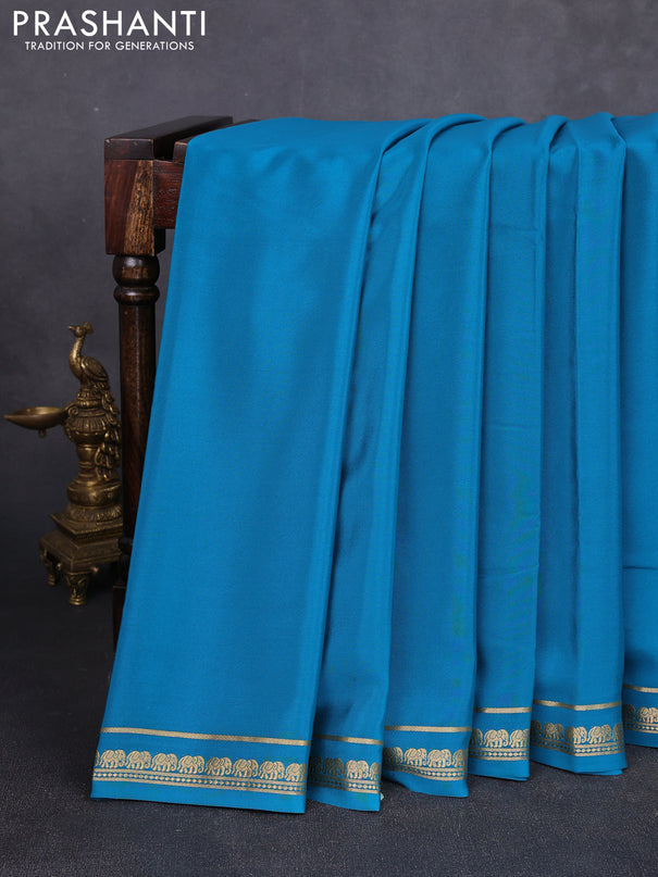 Pure mysore silk saree teal blue with plain body and small elephant zari woven border