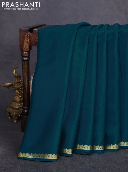 Pure mysore silk saree peacock green with plain body and small zari woven border