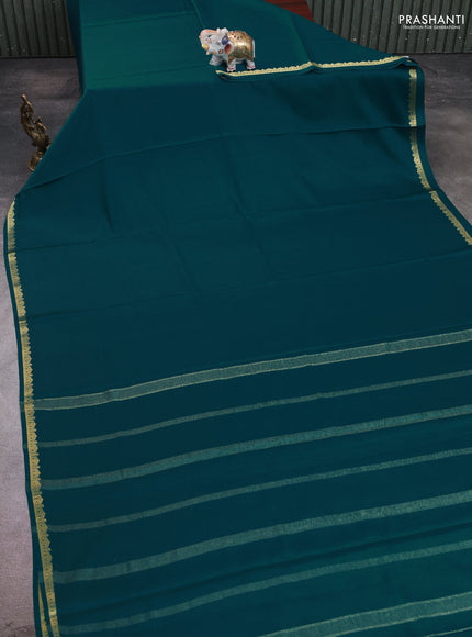 Pure mysore silk saree peacock green with plain body and small zari woven border