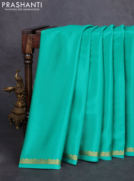 Pure mysore silk saree teal green with plain body and small zari woven border