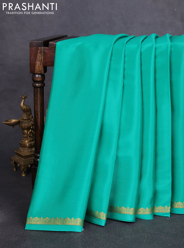 Pure mysore silk saree teal green with plain body and small zari woven border