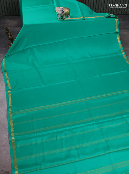 Pure mysore silk saree teal green with plain body and small zari woven border