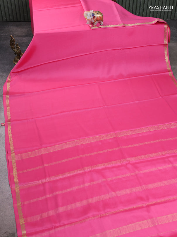 Pure mysore silk saree light pink with plain body and small zari woven border