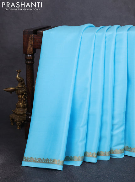 Pure mysore silk saree teal blue with plain body and small zari woven border