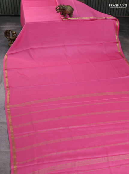 Pure mysore silk saree light pink with plain body and small zari woven border