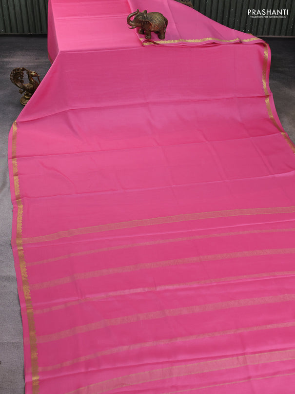 Pure mysore silk saree light pink with plain body and small zari woven border