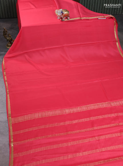 Pure mysore silk saree peach with plain body and small zari woven border