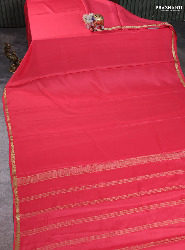 Pure mysore silk saree peach with plain body and small zari woven border