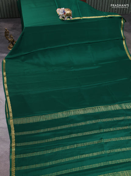 Pure mysore silk saree green with plain body and small zari woven border