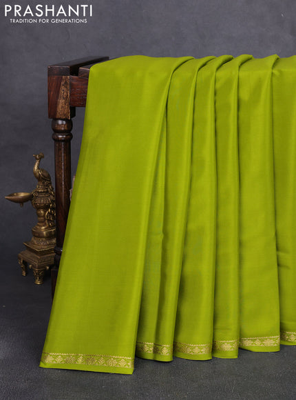 Pure mysore silk saree light green with plain body and small zari woven border