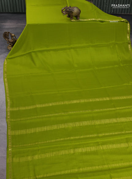 Pure mysore silk saree light green with plain body and small zari woven border