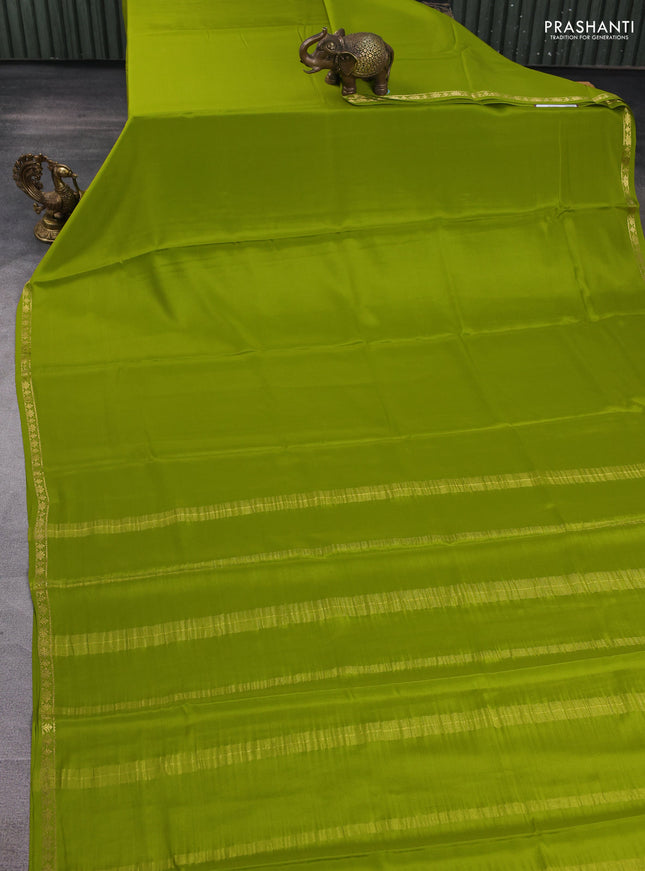 Pure mysore silk saree light green with plain body and small zari woven border