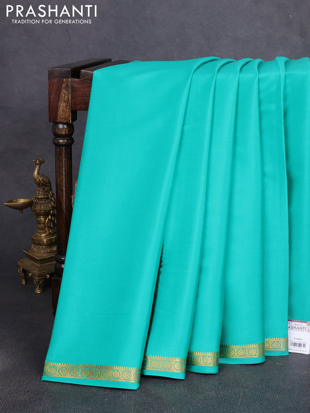 Pure mysore silk saree teal green with plain body and small zari woven border