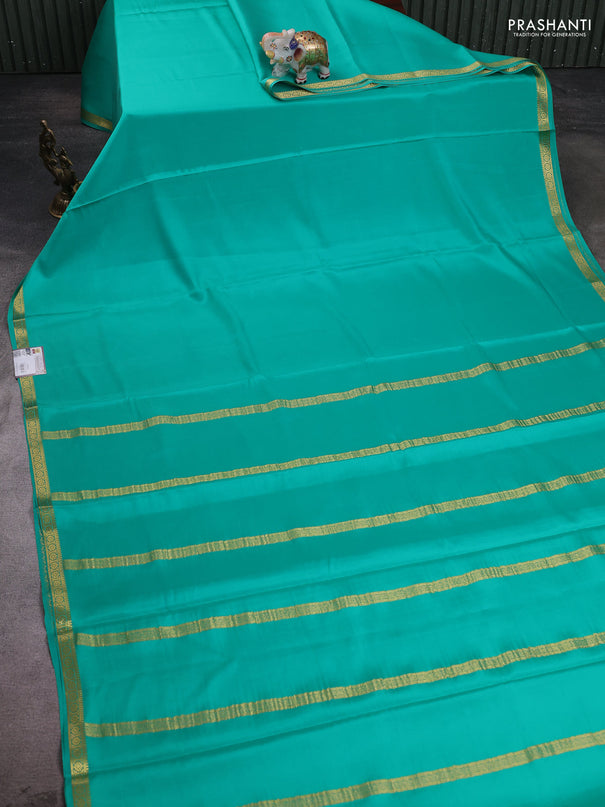Pure mysore silk saree teal green with plain body and small zari woven border