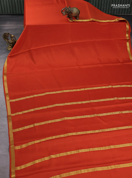 Pure mysore silk saree rust shade with plain body and small zari woven border