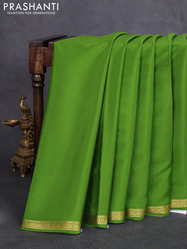 Pure mysore silk saree light green with plain body and small zari woven border