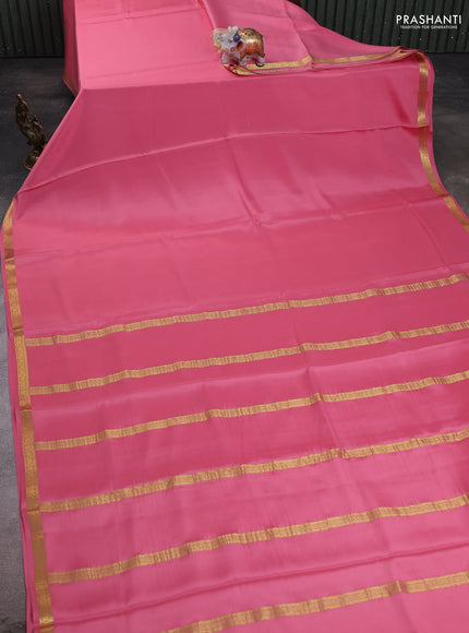 Pure mysore silk saree peach pink with plain body and small zari woven border