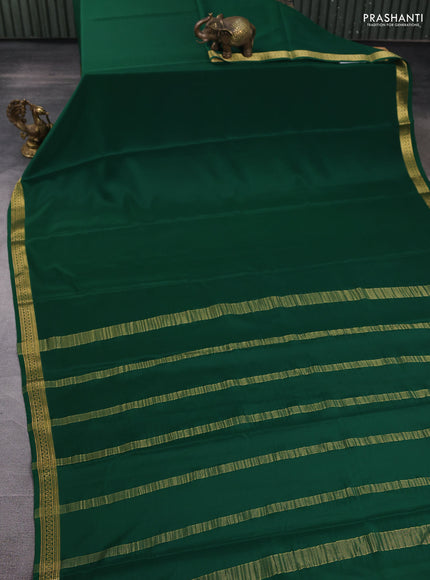Pure mysore silk saree bottle green with plain body and zari woven border