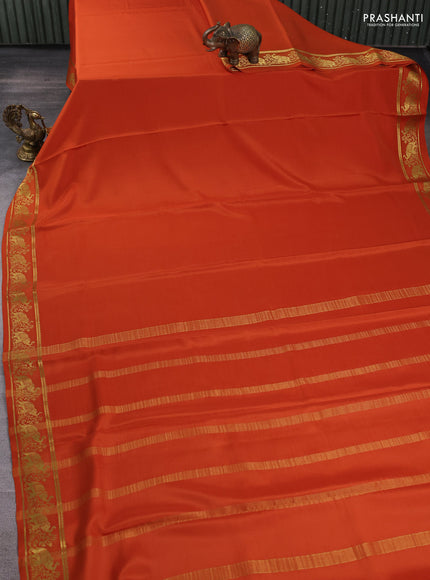 Pure mysore silk saree rust shade with plain body and zari woven butta border