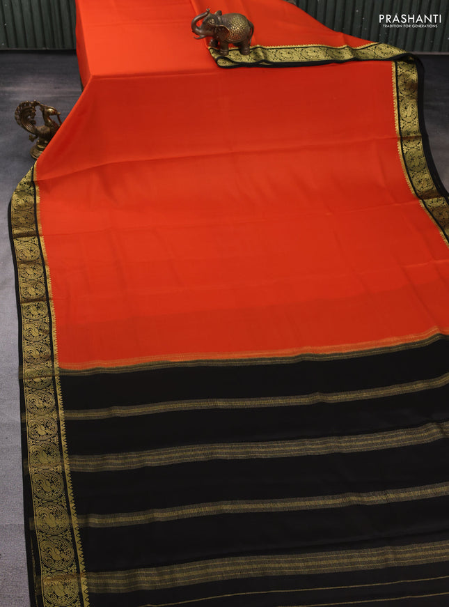 Pure mysore silk saree orange and black with plain body and peacock zari woven border