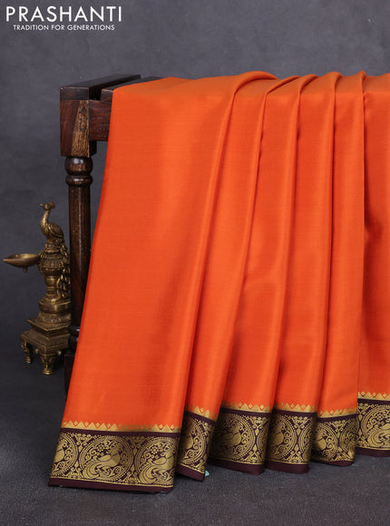 Pure mysore silk saree rust shade and coffee brown with plain body and peacock zari woven border