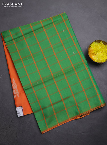 Banana pith saree green and orange with allover checks & thread woven buttas in borderless style