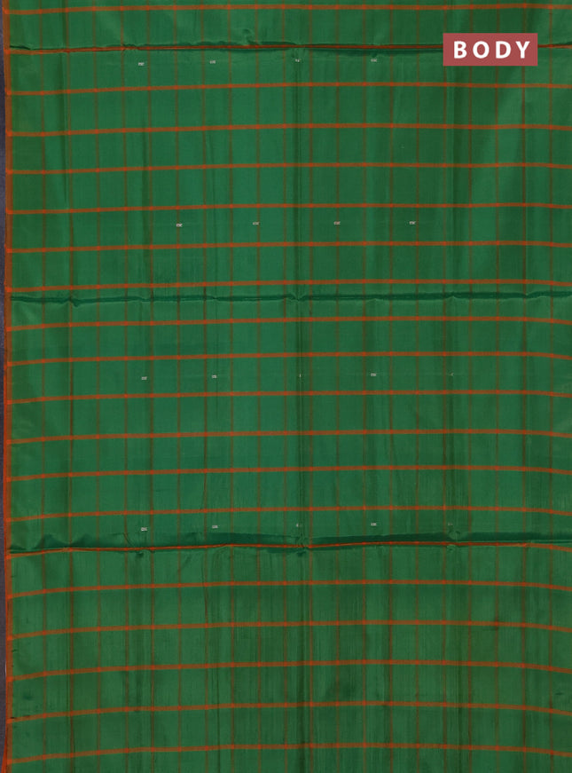 Banana pith saree green and orange with allover checks & thread woven buttas in borderless style