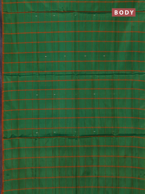 Banana pith saree green and orange with allover checks & thread woven buttas in borderless style