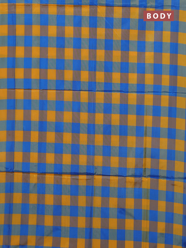 Banana pith saree mango yellow and teal blue with allover checks & thread woven buttas in borderless style