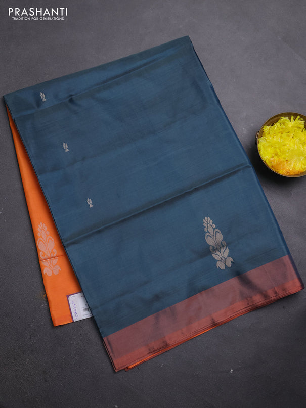 Banana pith saree peacock green and orange with thread woven buttas and simple border