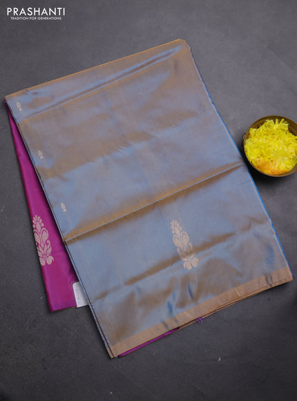 Banana pith saree dual shade of bluish orange and purple with thread woven buttas in borderless style