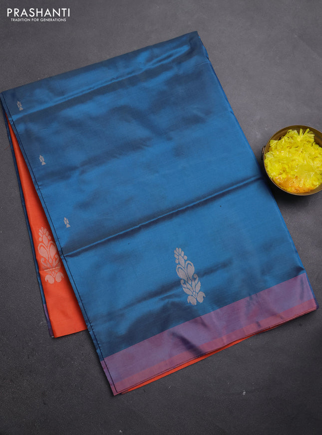 Banana pith saree peacock blue and orange with thread woven buttas and simple border