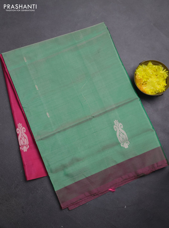 Banana pith saree green and pink with thread woven buttas and simple border