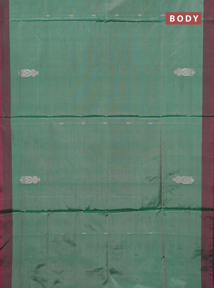 Banana pith saree green and pink with thread woven buttas and simple border