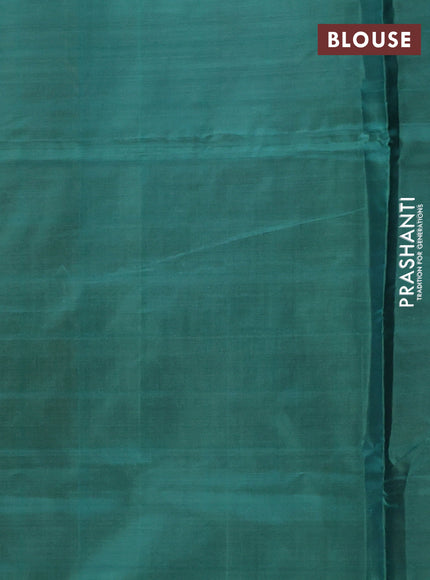 Banana pith saree orange and green with allover checks & thread woven buttas in borderless style