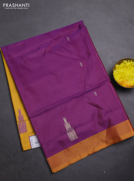 Banana pith saree purple and yellow shade with thread woven buttas and simple border