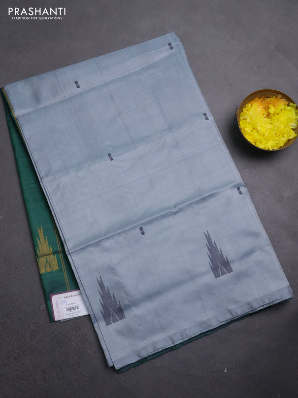 Banana pith saree grey shade and bottle green with thread woven buttas in borderless style