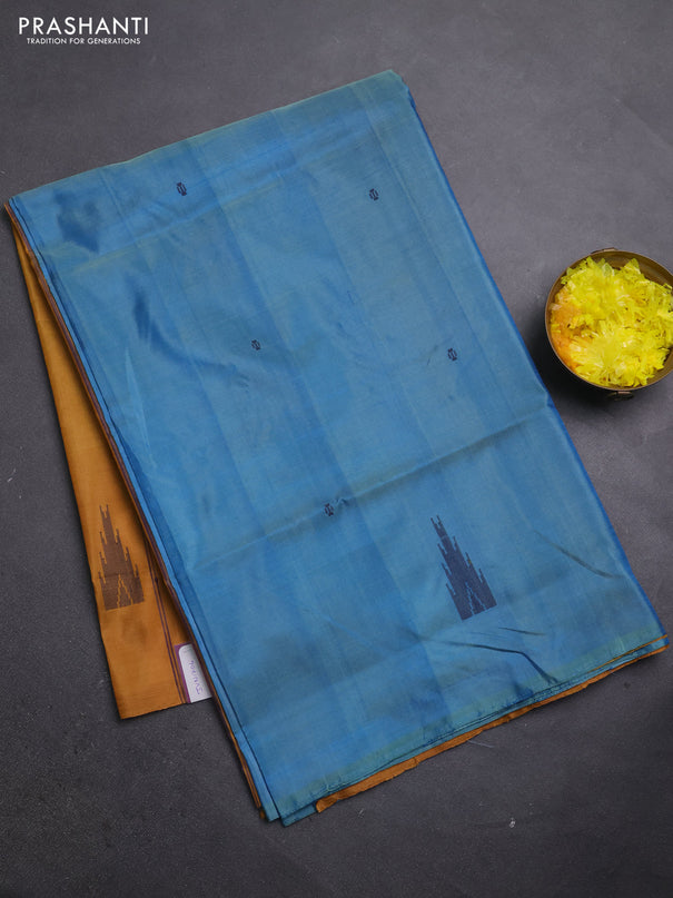 Banana pith saree blue and mustard with thread woven buttas in borderless style