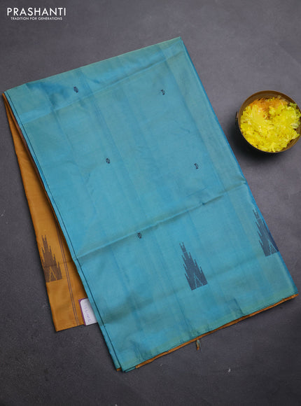 Banana pith saree teal blue and mustard shade with thread woven buttas in borderless style