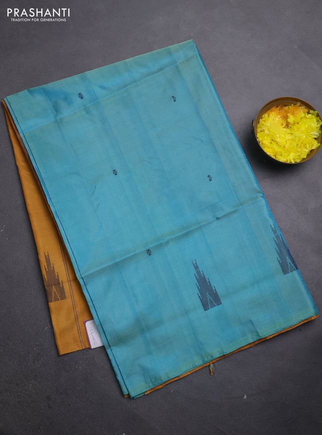 Banana pith saree teal blue and mustard shade with thread woven buttas in borderless style
